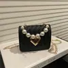 Bolsas Novas Estilosas e Únicas de Primavera, Bolsas de Ombro e Transversais Casuais da Moda, Bolsas Quadradas Pequenas Texturizadas Tendência Femininas 2026