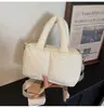Bolso acolchado de algodón 2026 Primavera Nuevo estilo Bolso de hombro Casual Color sólido Personalizado Simple Suave Pequeño bolso cruzado para mujer
