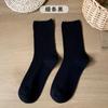 Soporte calcetines de tubo personalizados para dama una variedad de calcetines de felpa de color sólido ins japoneses opcionales fabricantes de calcetines de algodón al por mayor