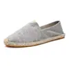 Moda de otoño de tendencia nuevos zapatos de lino para hombre y mujer zapatos de paja pescador un pedal mocasines de lona al por mayor