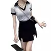 Falda corta negra con abertura para mujer, nueva popular primavera y otoño 2026, de cintura alta, adelgazante, anti-exposición, línea A