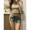 Shorts de Mezclilla Bajos para Mujer Estilo Hot Girl Verano Nuevo Estilo Remaches Rasgados Ajustados Elásticos que Cubren la Cadera Super Shorts Hot