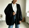 Suéter grueso de punto para mujer, estilo nuevo de otoño e invierno transfronterizo europeo y americano, ajuste holgado, cárdigan abrigo de punto para mujer, abrigo casual de manga larga