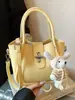 Bolso casual de nicho transfronterizo para mujer, nuevo y elegante de la primavera de 2026, bolso de mano cruzado de un solo hombro de alto valor para mujer