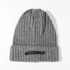 Gorro de pila con protección estándar para las orejas de tela de aguja gruesa en vivo de Red de fábrica gorro de punto rizado engrosado para mujer estilo extranjero marea gorro para el frío