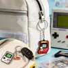 Llavero de Metal para Consola de Videojuegos Retro Transfronteriza Estilo Pixelado de Dibujos Animados Tetris de Mano Colgante Nostálgico Hecho a Medida