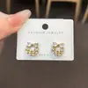 Brincos de laço nova moda doce requintado S925 prata agulha amor incrustado zircônio brincos feminino Dongdaemun estilo viajante