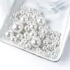 Suministro Directo de Fábrica ABS No Poroso Alto Brillo 2 mm - 25 mm Perlas de Burbuja Imitación Perla Estilo Coreano Perlas Brillantes Cuentas Sueltas para DIY Perlas de Imitación