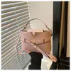 2026 Cor Sólida Nova Casual Grande Capacidade Retrô Temperamento Moda Feminina Simples Transversal Concha Bolsa de Ombro Bolsa Feminina