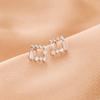 Aretes de aguja de plata S925 chapados en oro real, moda retro elegante de alta gama de Corea del Sur, nicho de lujo ligero frío, protección ambiental