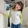 Camiseta Básica de Cuello Redondo para Niñas Moda Primavera y Otoño 2026 Manga Larga Popular para Niños y Bebés con Dobladillo Curvo