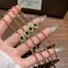 Venta al por mayor del fabricante Pulsera de Hilo Rojo de Jade Verde Natural Xiaohongshu con Incrustación de Plata S925, Nuevo Diseño de Estilo Chino