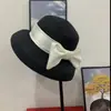 Chapéu de Palha de Aba Larga Elegante com Laço para Verão 2026 Estilo Japonês Versátil Proteção Solar Chapéu de Sol Chapéu de Pescador Tendência Autoproduzido