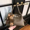 Bolsa de Hombro Estilo Nuevo Invierno 2026 Transfronteriza Bolso Pequeño Retro Bolso Cruzado de Moda para Mujer Bolso de Mano Bolso Cubo