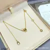 Versión de Alta Gama Collar de Cerámica Hombrecito Rojo Baojia con Diseño de Cintura Delgada con Resorte, Edición Benéfica, Incrustado con Pedrería, Chapado en Plata 925, Cnc