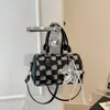 Bolsa de mano con textura de alta calidad al por mayor, bolsa tipo almohada, bolso para mujer, nuevo de otoño 2026, bolso de hombro de mezclilla a cuadros, bolso cruzado para el trabajo