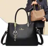 Moda Feminina Coreana Nova Outono/Inverno 2026 Bolsa Transfronteiriça Bolsa de Maternidade Portátil Tendência Bolsa de Ombro Único Transversal Grande Capacidade com Múltiplas Camadas