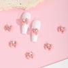 Popular online popular acessórios de unhas arco de coração de dragão oblíquo gravata borboleta linda menina amor diamante decorações de unhas atacado