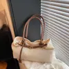 Bolsa de mano casual tejida de paja para mujer, nueva moda 2026 diseño calado, gran capacidad, bolso de axila de verano