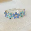 Huajie Wish Empaquetado Individualmente Más Vendido Estilo Nuevo Pequeño Fresco y Elegante Floral Europeo y Americano Anillo Azul Diamante
