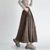 Falda plisada para mujer, nuevo estilo otoño e invierno, de cintura alta, con cordón, falda midi fluida, falda de paraguas con dobladillo ancho