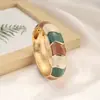 Bestseller transfronteiriço na Europa e América: Pulseira de design irregular em blocos de cores esmaltadas retrô criativas com design de bambu ondulado boêmio