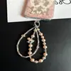 Nueva Cadena de Muñeca para Teléfono Móvil de Aleación de Cristal Ins con Colgante de Caballo Perla Lanyard Elegante para Bolso Doble Capa Exquisita