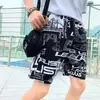 Pantalones de playa de verano para hombre moda juvenil pantalones estampados talla grande holgados casual shorts para hombre venta al por mayor