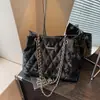 Otoño 2025 Nueva Tendencia de Moda Bolso Tote Simple de Color Sólido Bolso de Hombro Cruzado Bordado Acolchado Texturizado para Viajes