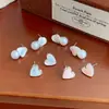 Aretes de Corazón Azul Manchado para Mujer, Pines de Plata, Dulces de Verano, Ligeros, Lujosos, de Gama Alta, Elegantes, Aretes de Corazón de Niña con Lazo