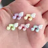 Mini Accesorios de Resina con Forma de Ala de Nota Musical Símbolos Musicales Pequeños Decoración para Funda de Teléfono Pasador Materiales de Decoración con Pegamento de Crema Hecho a Mano