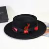 Venta caliente transfronteriza Amazon LAZADA otoño e invierno anillo de rizo de lana gorra plana de jazz sombrero de lana unisex