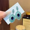 Pendientes de Botón de Moda Transfronterizos Europeos y Americanos con Circonita Hueca en Forma de Gota de Agua para Mujer Personalidad de Nicho Pendientes Colgantes con Sentido de Alta Gama Pendiente de Temperamento