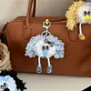 Celebridade da Internet Fofa Boneca de Cabelo Cacheado Chaveiro Desenho Animado Boneca Fofa Pingente de Mochila Feminina Brinquedo Feio-Bonito Decoração Presente