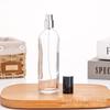 Botella de perfume cilíndrica de 100 ml, transparente, con prensa de vidrio, con pulverizador, tipo bayoneta, vacía.