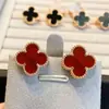 Pendientes de botón de trébol de dos piezas microincrustados de circonio, positivos y negativos, pendientes de botón de oreja de hierba de la suerte, diseño de lujo ligero de alta calidad