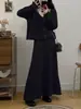 Nuevo Conjunto de Dos Piezas para Mujer Otoño e Invierno 2025: Cárdigan Suéter con Flor Estéreo Francesa + Falda de Punto Ajustada de Cintura Alta