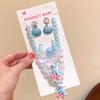 Pulsera infantil de sirena de nueva celebridad en línea, linda concha, clip de oreja sin dolor, anillo de pelo de princesa sirena, traje, caja de regalo