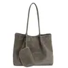 Bolsa Tote de Luxo Acessível e Simples para Mulheres 2025 Inverno Nova Tendência Grande Capacidade Cor Contrastante Estilo Estrangeiro Bolsa de Ombro Único