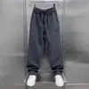 Primavera e Outono 2025 Novas Calças Casuais Scimitar Masculinas Estilo Coreano Tendência Soltas de Perna Reta Patchwork Marca Tendência Calças Esportivas Masculinas
