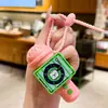 Nuevo llavero divertido de micrófono de grabación, lindo juguete de panda de dibujos animados tocando música, colgante para bolsa de estudiante