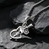 Joyería al por mayor cuerno feliz cara sonriente cabeza de diablo colgante cabeza de fantasma acero de titanio collar colgante colgante una generación de SP243