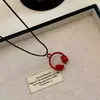 Moderno e Versátil! Colar com Pingente de Fone de Ouvido para Mulheres, Corrente Longa no Pescoço Estilo Ins, Novo Acessório com Design de Nicho 2026