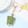 Chaveiro Pingente de Tartaruga Popular Europeu e Americano com Strass de Metal Pequeno Acessório Exquisito Pedra Olho de Gato Chaveiro Atacado