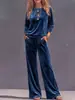 Conjunto casual suelto de top de manga larga de color liso con cuello redondo para mujer y pantalones casuales de pierna ancha, estación independiente transfronteriza europea y americana 2026