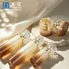Set de frascos de loción para el cuidado de la piel botellas vacías en stock 30g tapa acrílica giratoria frasco de crema transparente spray degradado OEM