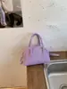 Bolsa de travesseiro vintage transfronteiriça para mulheres, novo modelo 2026, bolsa de mão de moda para o dia a dia, bolsa de ombro e transversal, bolsa Boston versátil