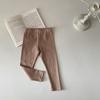 Leggings de bebé de estilo coreano, nuevos pantalones de algodón de cintura media, ropa exterior informal de color sólido para niños, leggings ajustados