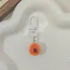 Llavero con forma de corazón para niña, diseño de tarta de huevo, pudín de oso, botón blanco I28, accesorio para colgar en el bolso del estudiante