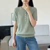 Nuevo estilo de verano, algodón puro, manga corta, tejido de seis botones, retro, trenzado, medio abierto, cuello redondo, suéter, top simple y fino para mujer